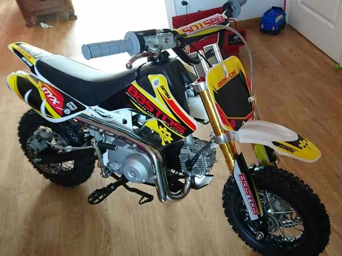 Echange Moto Cross 90cc semi automatique