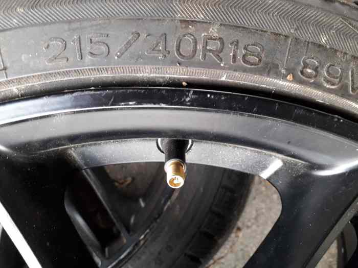 2 jantes alu neuves entraxe 110 dimensions 7/1/2 par 18  plus pneus neuf neige Nokiang 215/40/18 2