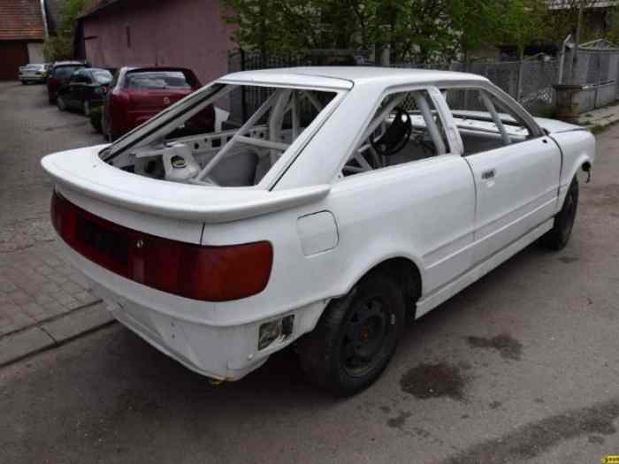 Audi rally car with a lot things 2