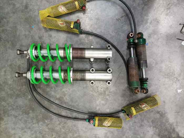 Vends 4 amortisseurs 3 voies Alp suspension pour 306 0