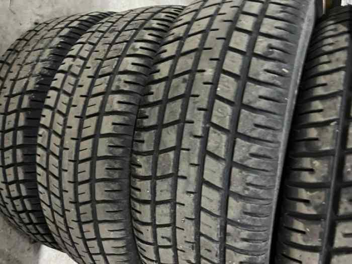 4 pneus Michelin P2B pluie 16/57-14 comme neufs 0