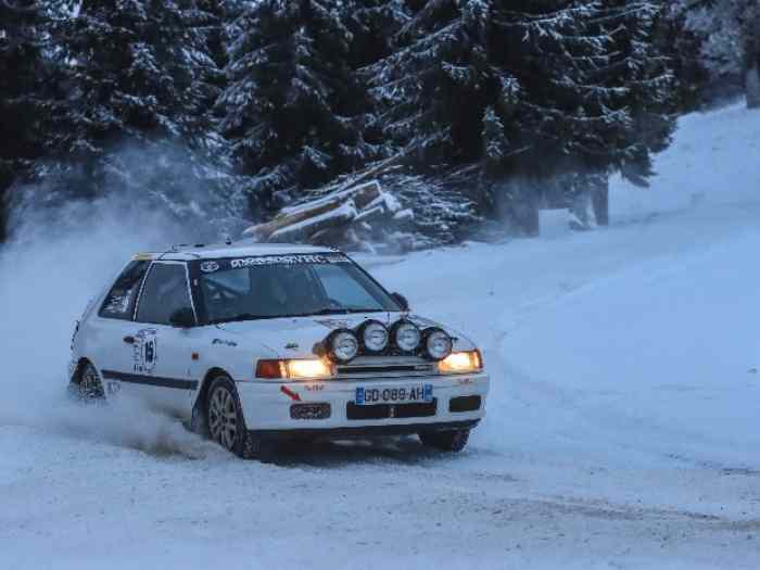 Mazda 323 VHC Gr À , passeport inter 1