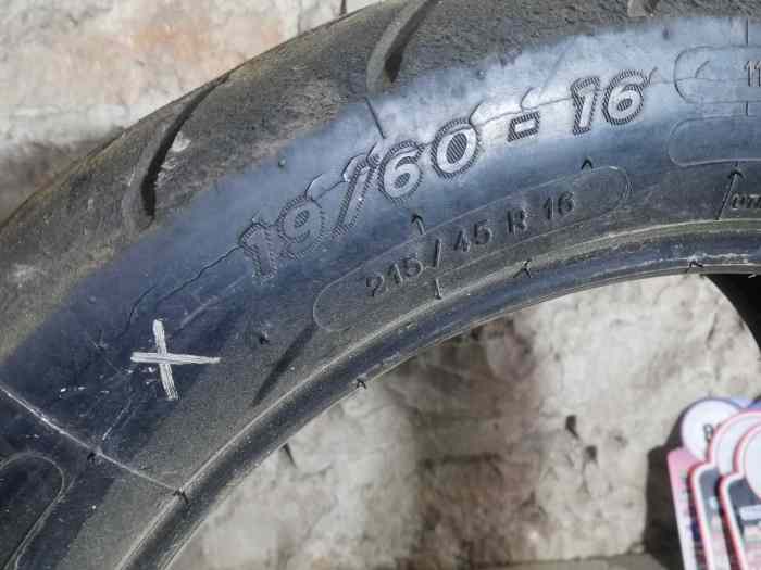 1 pneu Michelin R11 ouvert en pluie 16p 2