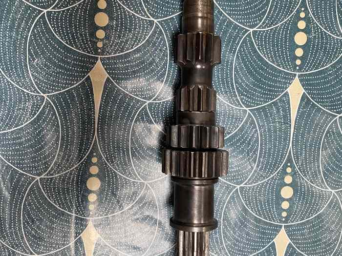 Arbre primaire boîte MA + 1 pignon crabot 0