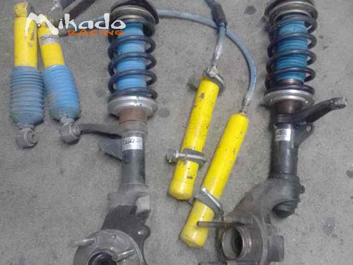 Vends 4 amortisseurs terre Saxo 106 complet