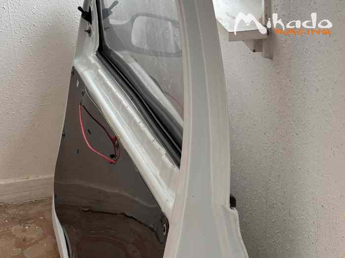 Des Portes en plastique Clio 3 1