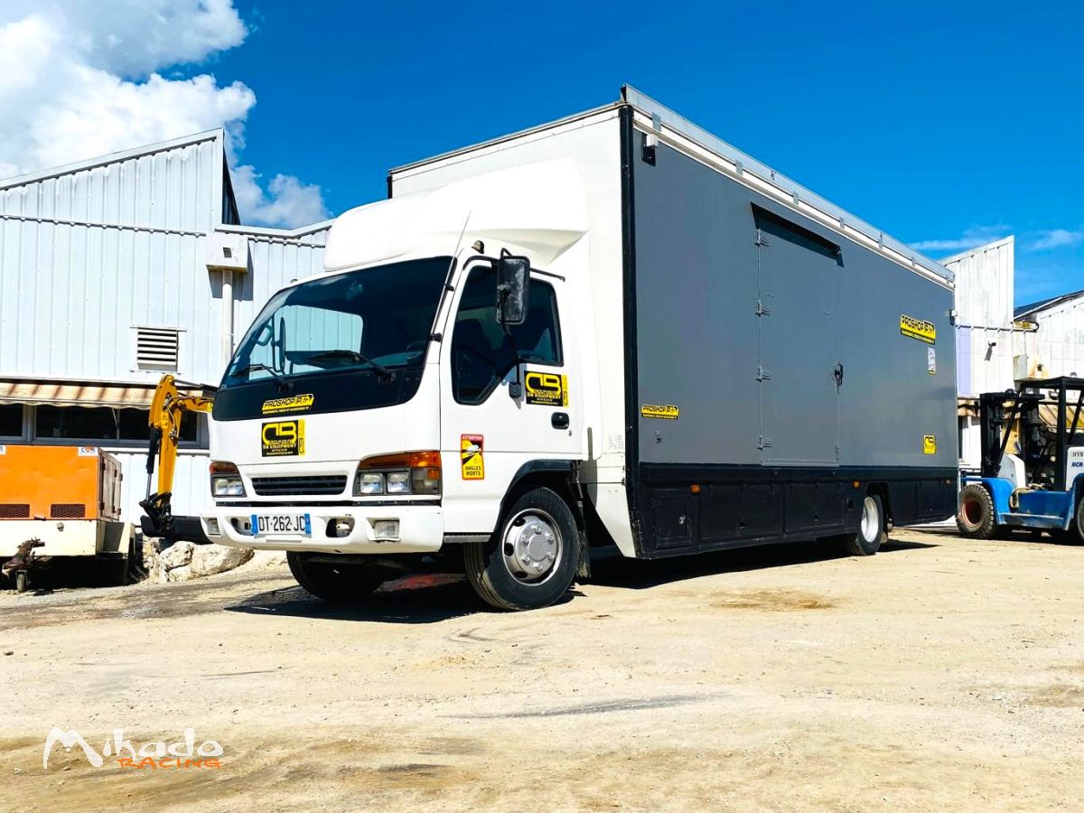 Camion équipé ISUZU série N avec 2 structure chapiteaux – photo 2 sur 6